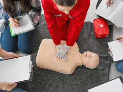 AHA CPR training in progress.